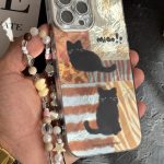 قاب موبایل ( آیفون ) پلنگی گربه سیاه میو + بندست