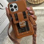 قاب موبایل آیفون فندی چرمی قفل فلزی جاکارتی + بندست بلند