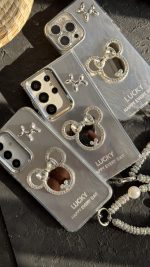 قاب موبایل ( آیفون - سامسونگ ) میکی اسکوییکی داگ آیینه ای نگین دار + بندست - تصویر 2