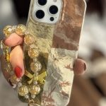 قاب موبایل آیفون براش پروانه طلایی + بندست پاپیون