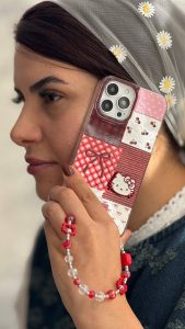 قاب موبایل آیفون کیتی چری آلبالویی پاپیون دار + بندست - تصویر 3