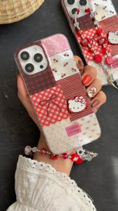 قاب موبایل آیفون کیتی چری آلبالویی پاپیون دار + بندست