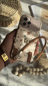 قاب موبایل ( آیفون ) گل رز فلورا قهوه ای + بندست چرمی - تصویر 2