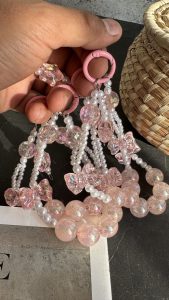 بند و آویز پاپیون و ستاره صورتی